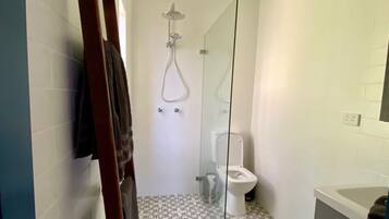 Shower, eco-friendly toiletries, towels, soap