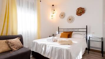 2 slaapkamers, een strijkplank/strijkijzer, internet, beddengoed