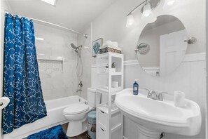 Hair dryer, towels, soap, shampoo