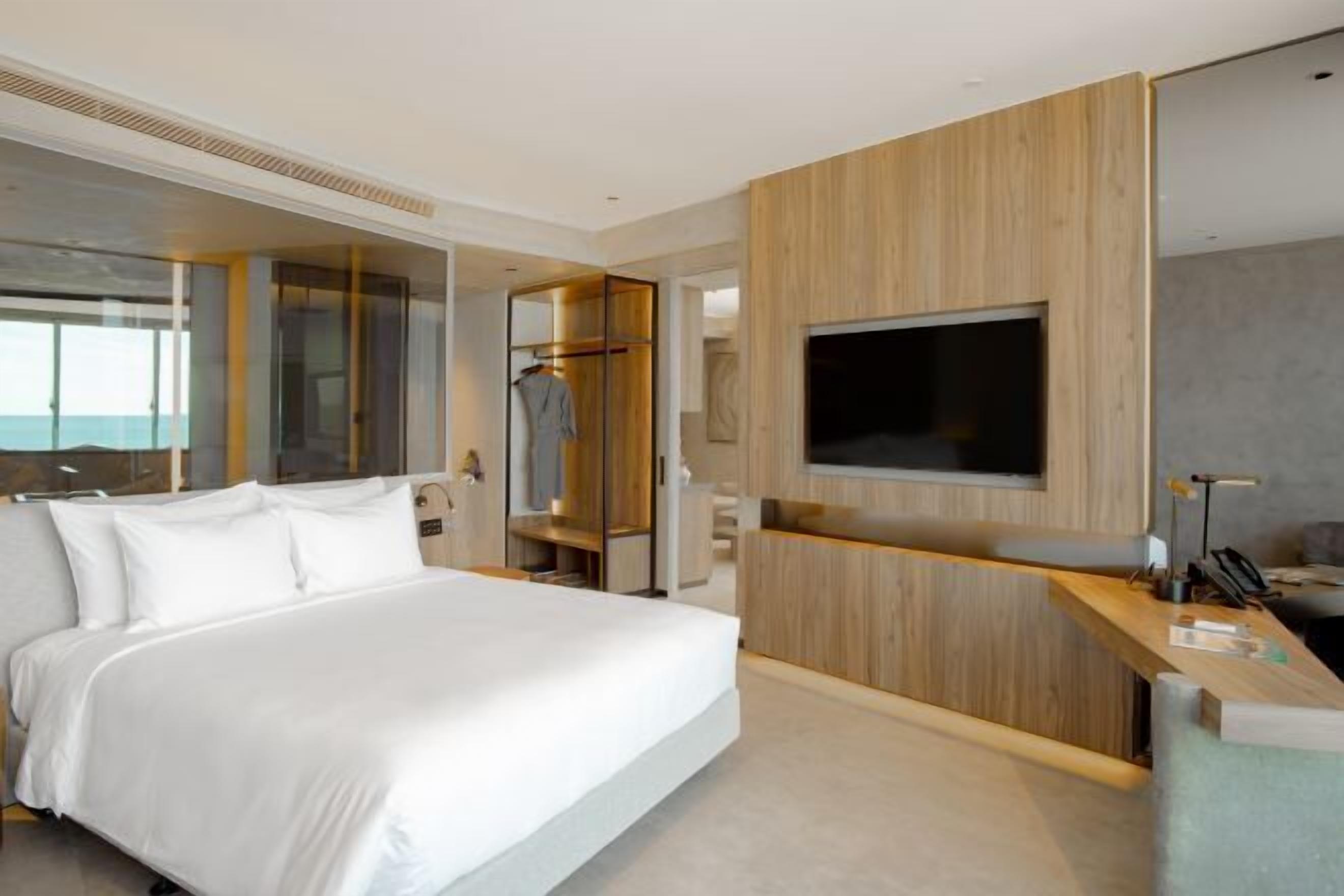 Ropa de cama de alta calidad, minibar, escritorio