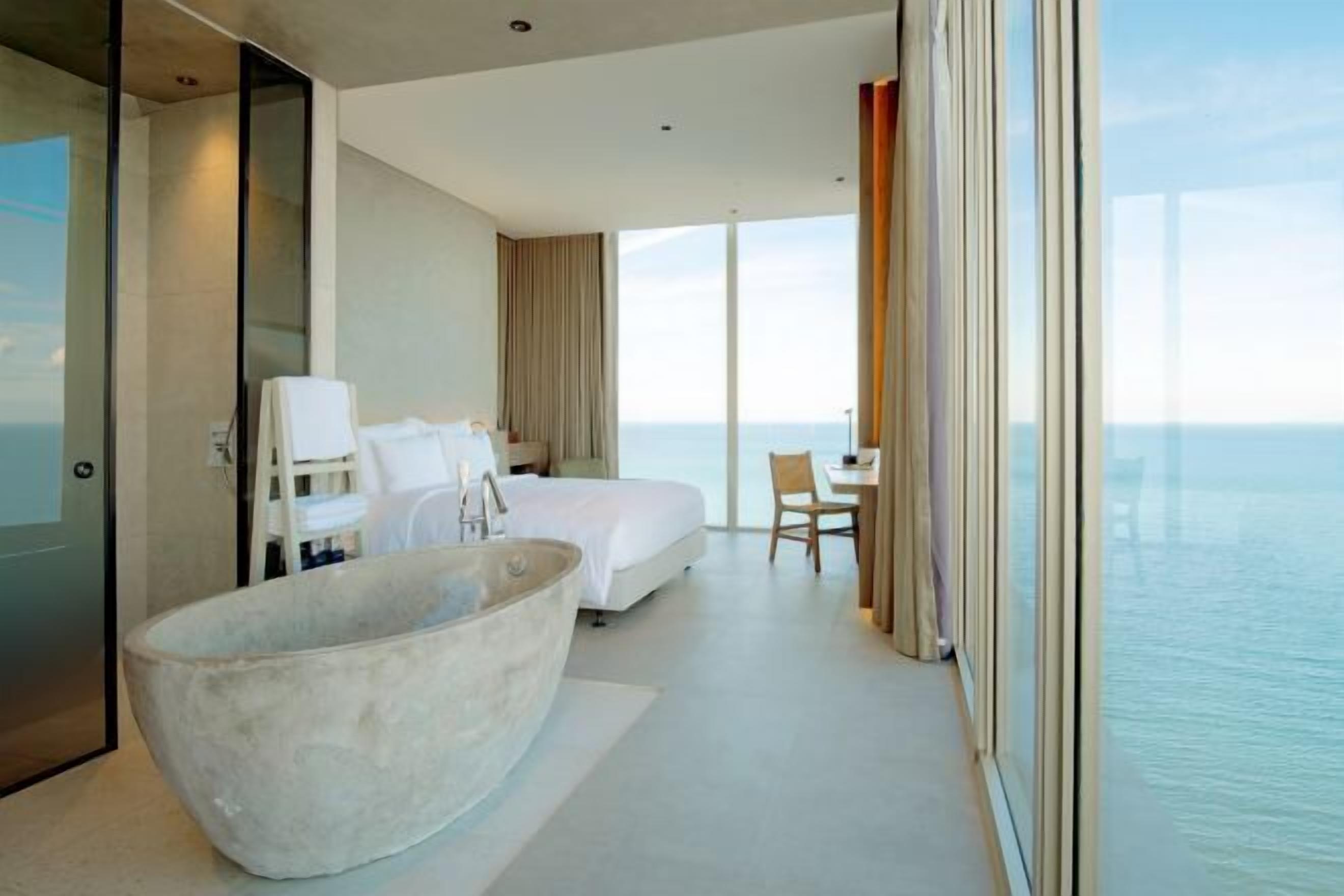 Ropa de cama de alta calidad, minibar, escritorio