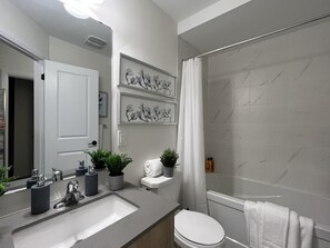 Hair dryer, towels, soap, shampoo
