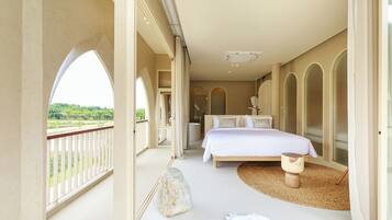 Suite, Pool View | 1 bedroom, free minibar, in-room safe, individually decorated