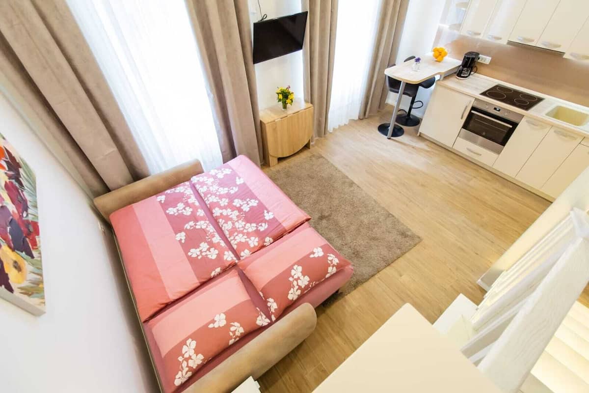 Apartamento Business | 1 dormitorio, escritorio, wifi gratis y ropa de cama