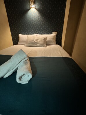 Quadruple Room | Hypo-allergenic bedding, in-room safe, individually decorated