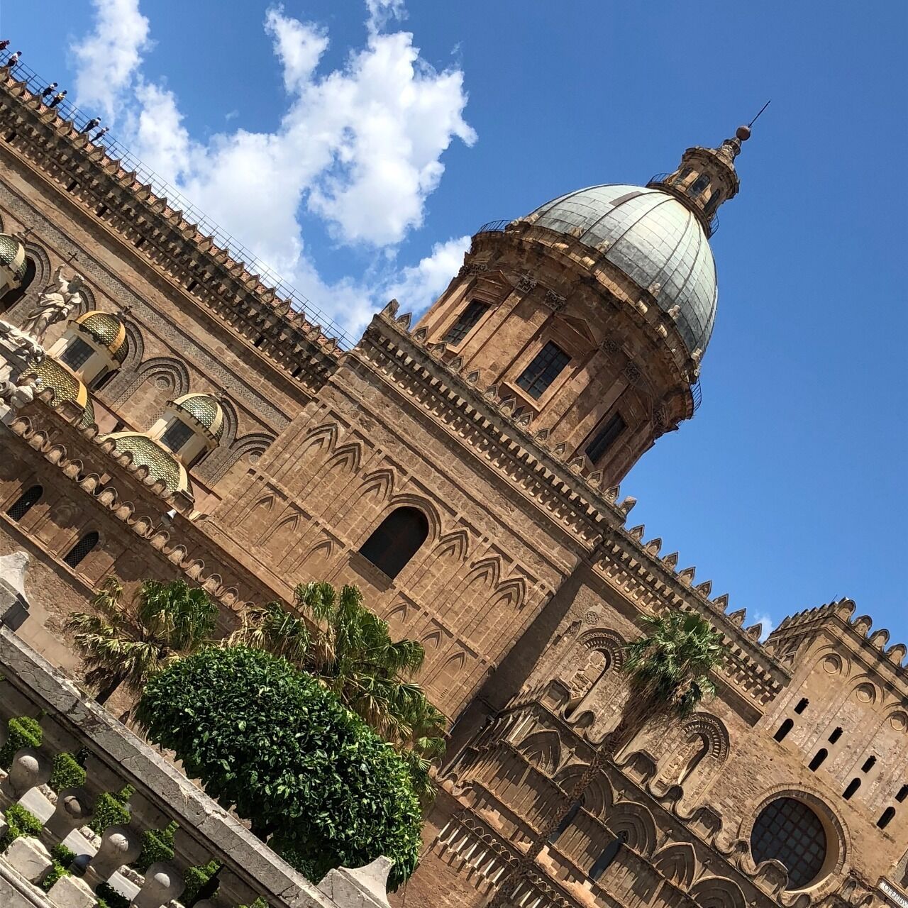 A historic building with a large dome and intricate architectural details.