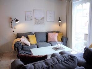 Smart TV, fireplace, books