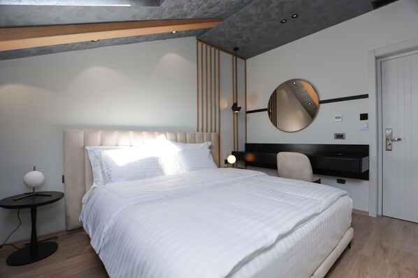 Chambre Simple Deluxe | Chambres insonorisées, Wi-Fi gratuit, draps fournis