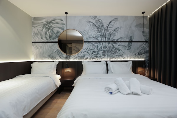 Deluxe-Dreibettzimmer