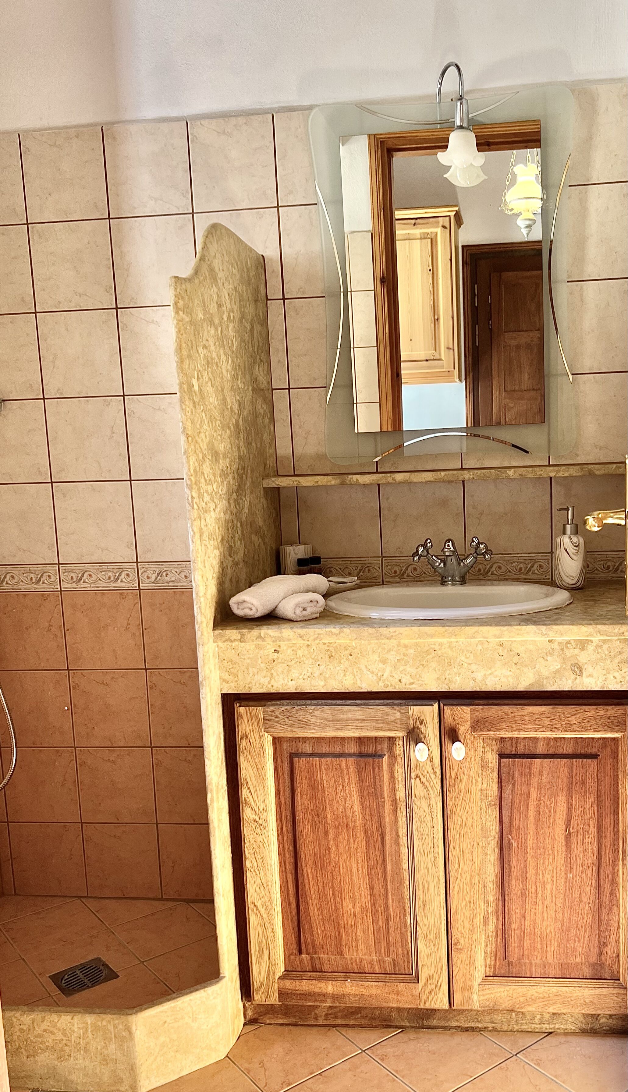 Apartment, Sea View, Ground Floor | Bathroom | Shower, hair dryer, towels