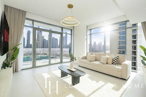 Apartment | Living area | Flat-screen TV - LUX The Marina Vista Beachfront Suite  (Dubai)