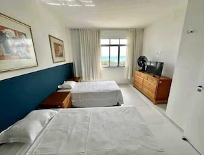 Hypo-allergenic bedding, blackout drapes, iron/ironing board, free WiFi