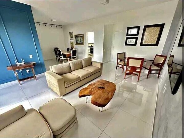 Superior Apartment | Living area | 32-inch Smart TV with satellite channels, first-run movies