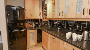 Fridge, dishwasher, electric kettle, toaster