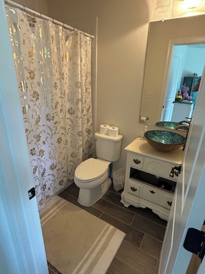 Hair dryer, towels, soap, shampoo
