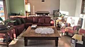 50-inch TV with satellite channels, DVD player, pay films