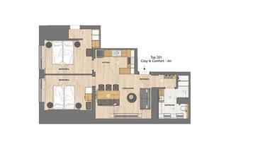 Ein Grundriss eines Air Apartments Cosy & Comfort – Top 201, mit zwei Schlafzimmern, einer Küche, einem Wohnzimmer, einem Badezimmer und einem Eingangsbereich.