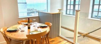 Our cosy 2-bedroom apartment is just steps away from New Quay beaches 