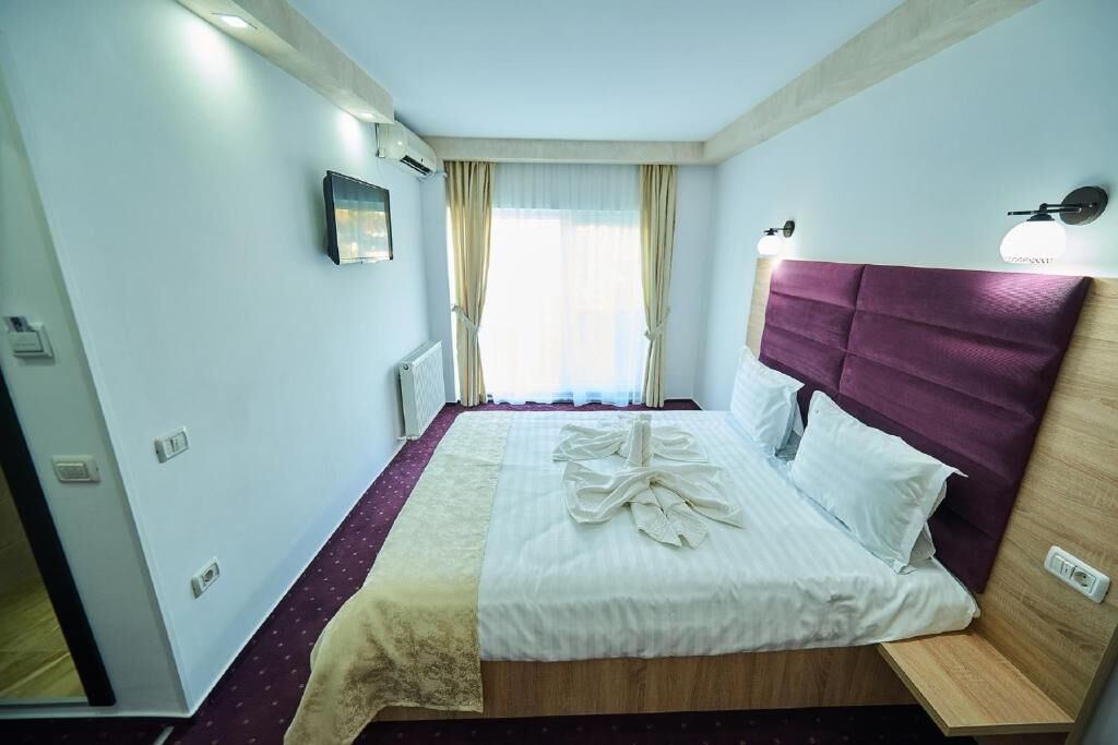 غرفة مريحة | مكتب ومكواة/لوح كي وملاءات أسرّة