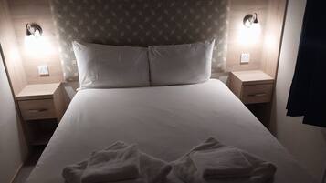 2 habitaciones, cuna de viaje, internet y ropa de cama