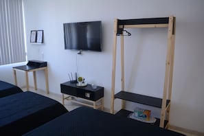 1 chambre, fer et planche à repasser, Wi-Fi, literie fournie