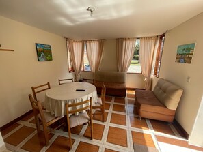 Cabin | Living area | Flat-screen TV - Cabañas Bungalows Calandaima (Paipa)