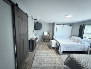 1 bedroom, desk, iron/ironing board, travel cot