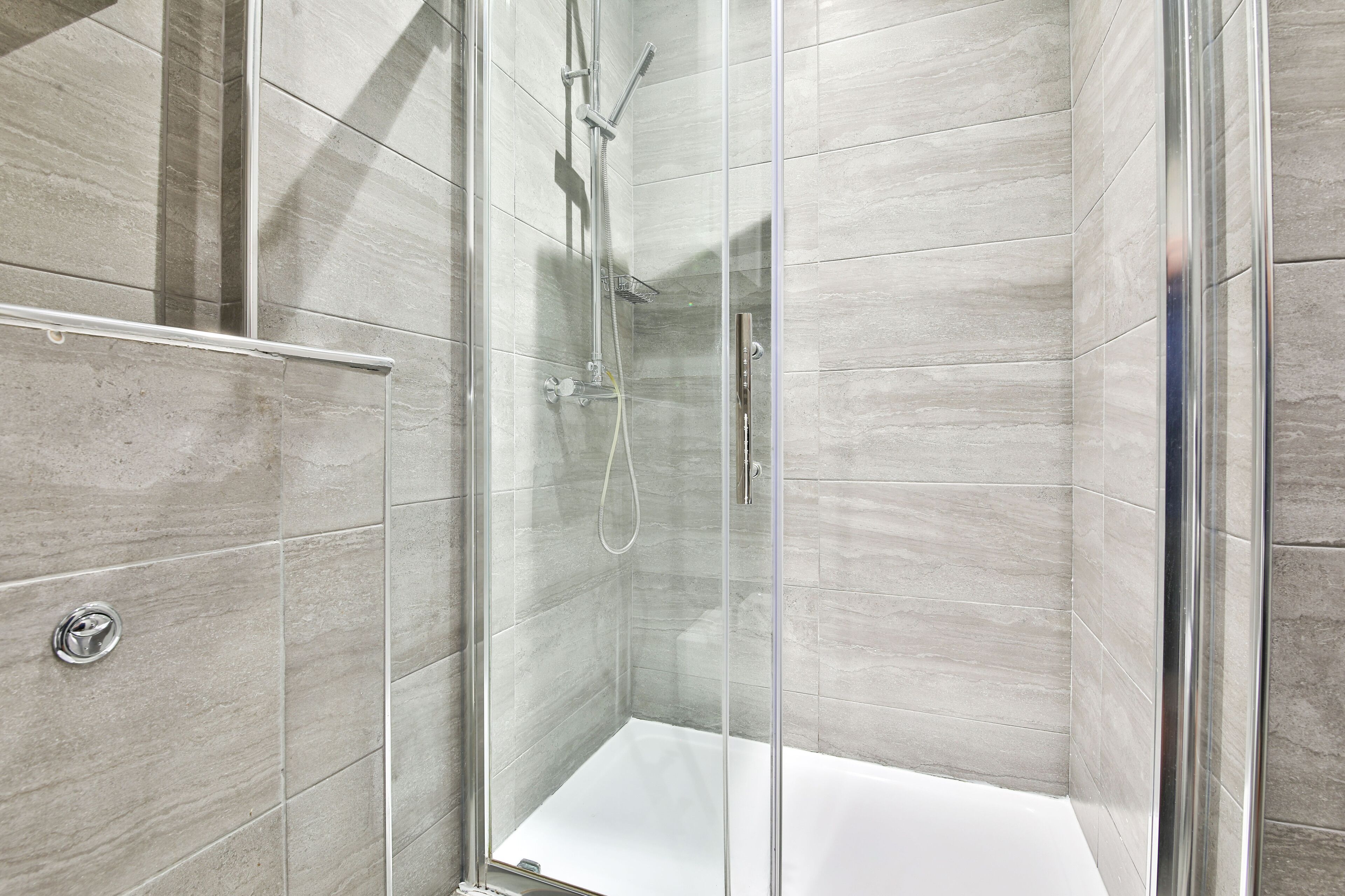 Standard Apartment | Bathroom | Shower, rainfall showerhead, hair dryer, towels
