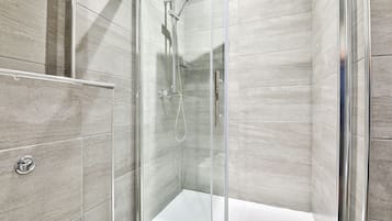 Standard Apartment | Bathroom | Shower, rainfall showerhead, hair dryer, towels