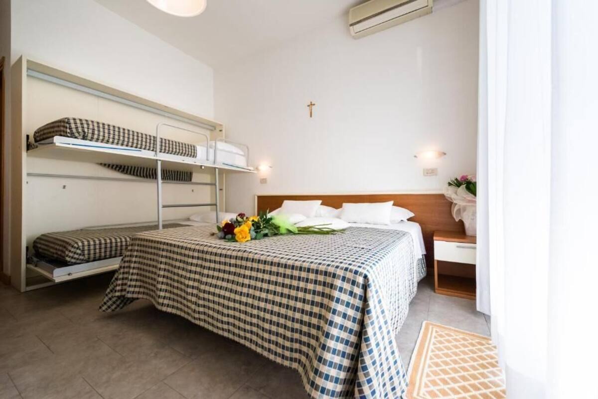 Comfort Quadruple Room | Minibar, in-room safe, individually decorated, individually furnished