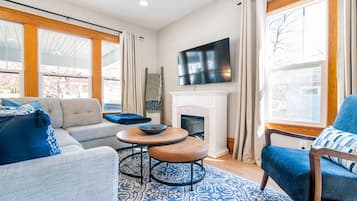 Smart TV, fireplace, books