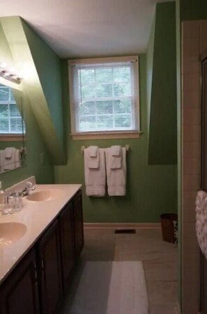 Shower, hair dryer, towels, soap