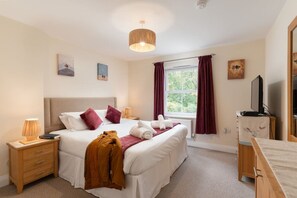 4 bedrooms, iron/ironing board, travel cot, WiFi