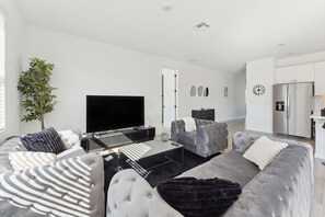 Living area - Luxury 3BR Home near Disney - GameRoom, Pool, Golf, BBQ, Tennis, Gym, Volleyball (Davenport)