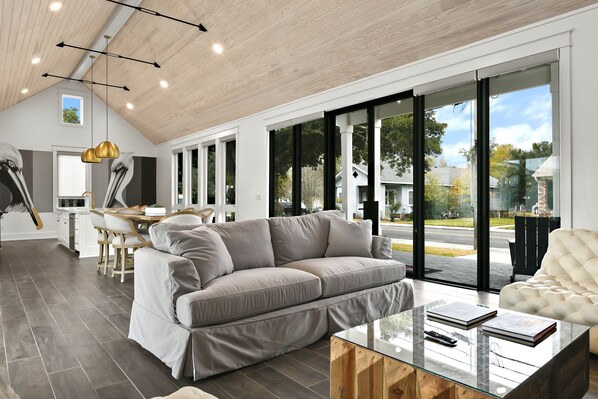 Smart TV, books, stereo - The Luxe on Main is an Ultra-Modern, Trendy New Construction in Downtown BSL. (Bay St. Louis)