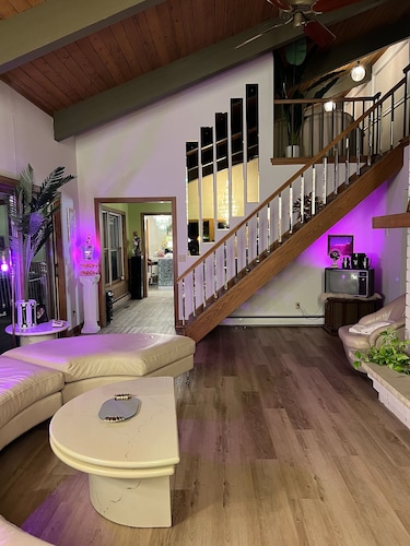 Vintage kitsch 70s/80s themed house with indoor pool and backyard creek