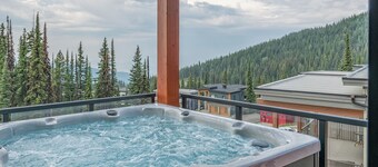 Brand new duplex with 2 king beds, elevator, private hot tub, ski in and out. 