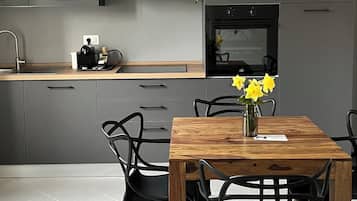 Classic Apartment | Living area | 32-inch Smart TV with digital channels