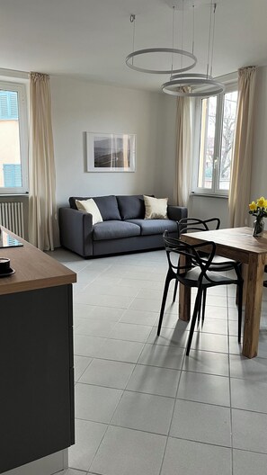 Apartamento conforto | Área de estar | Smart TV 32 polegadas com canais digitais