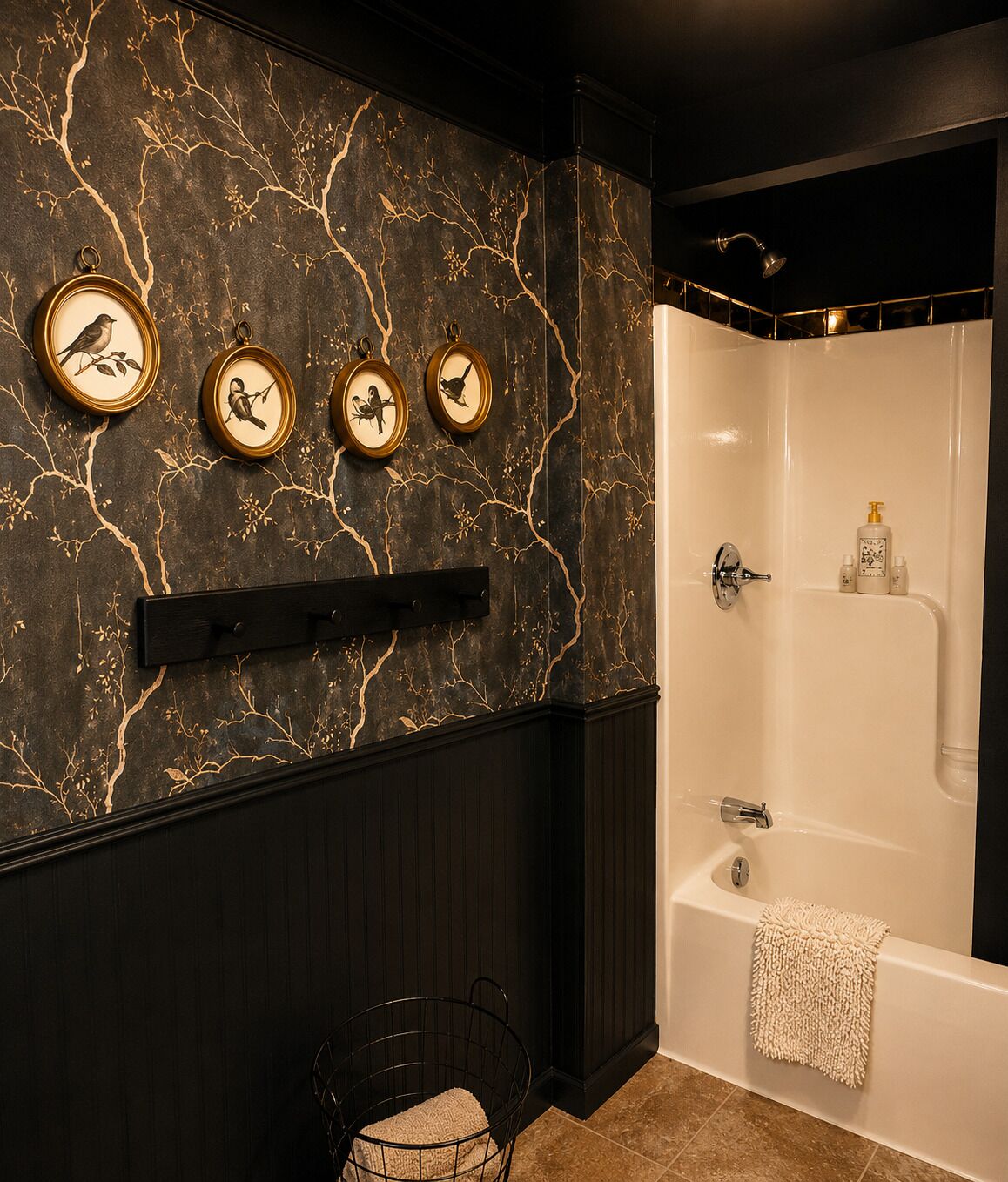 A bathroom with a marble wall, a bathtub, and three wall-mounted clocks.
