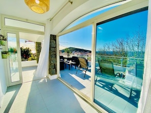 Enjoy a seamless transition from indoor to outdoor living with a spacious interior and expansive views of the surrounding landscape.