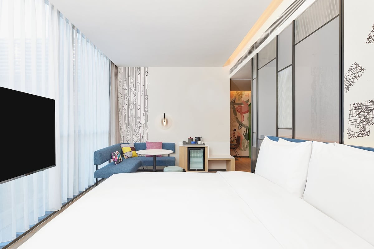 Premium bedding, down duvets, in-room safe, desk