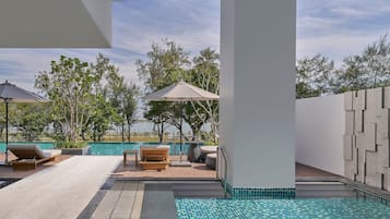 Outdoor pool, open 6:00 AM to 8:00 PM, pool umbrellas, pool loungers