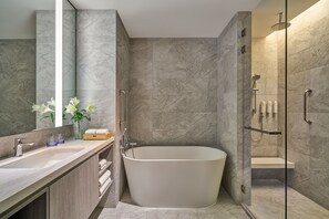 Separate bathtub and shower, hair dryer, slippers, electronic bidet - Marriott Executive Apartments, Penang (George Town)