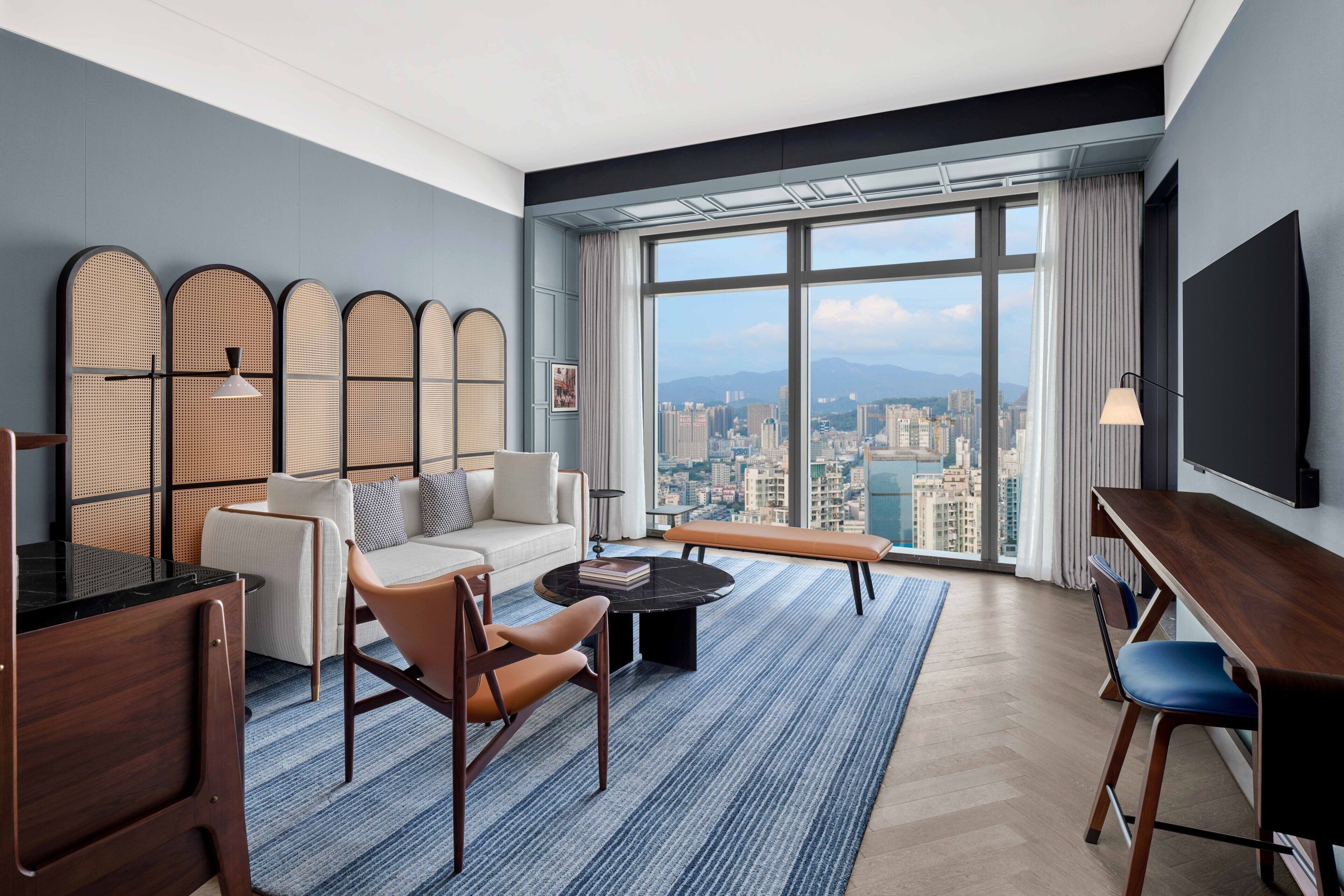 Executive Suite, 1 King Bed, City View | Living room | 55-inch LCD TV with cable channels