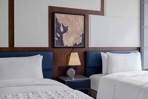 Premium bedding, down comforters, minibar, in-room safe