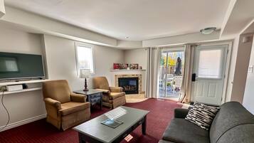 Smart TV, fireplace, books