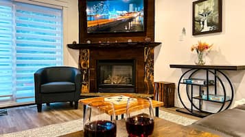 Smart TV, fireplace, books