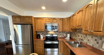 Escape to a 2 bdrm home in quiet area w/ full kitchen, private patio w/BBQ
