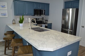 Fridge, microwave, oven, stovetop - Recently updated 3 bedroom/2 bath condo in Sunset Village at Sandpiper Bay  (Sunset Beach)